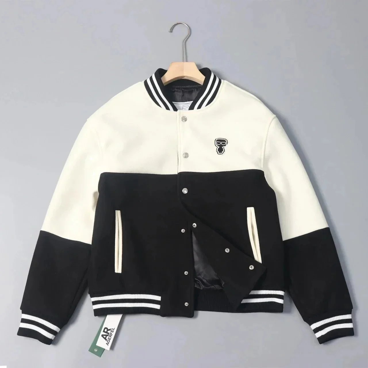 Black and White Baseball Jacket with Skull Logo