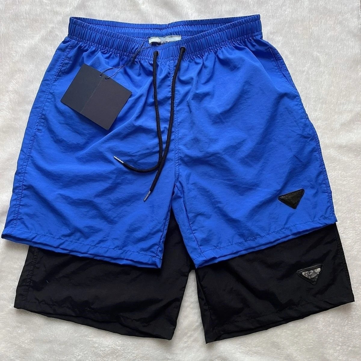 Prada Men's Blue and Black Swim Shorts with Logo Patch