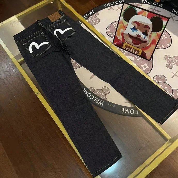 Dark Blue Jeans with White Logo Pockets