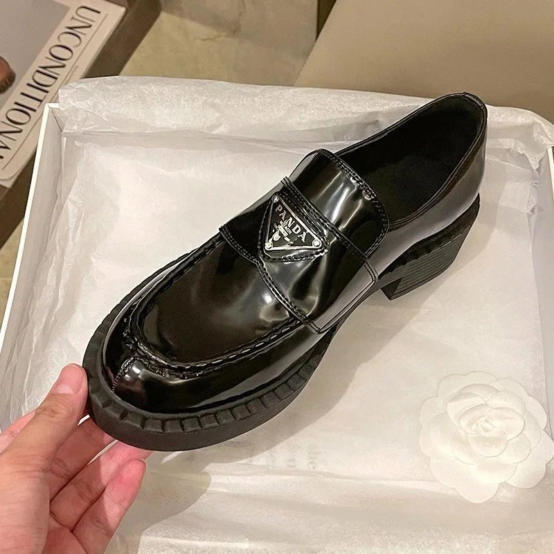 Black Patent Leather Loafers with Triangular Logo