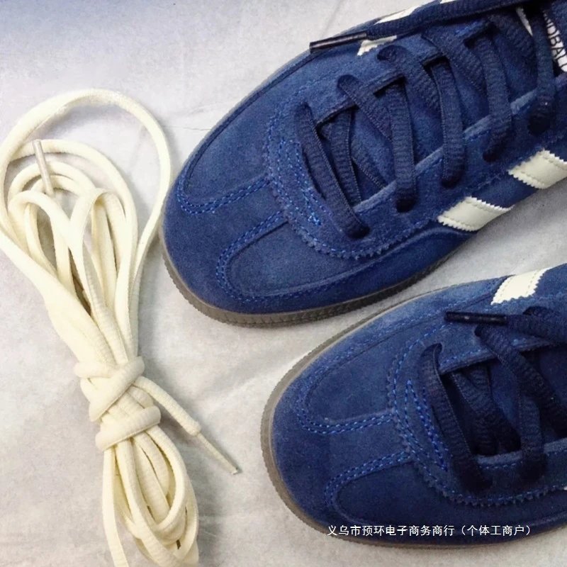 Blue Adidas Sneakers with White Laces