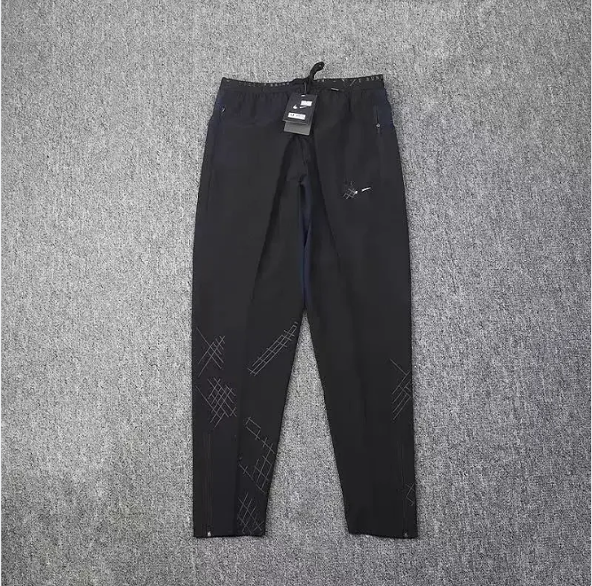 Nike Men's Black Performance Pants with Geometric Design