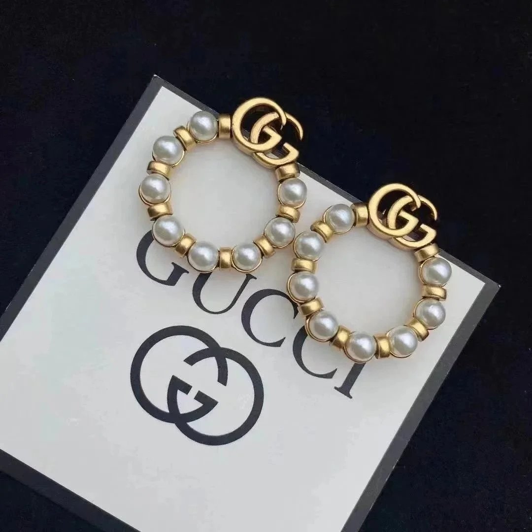 Gucci Pearl Bracelets with Gold GG Logo