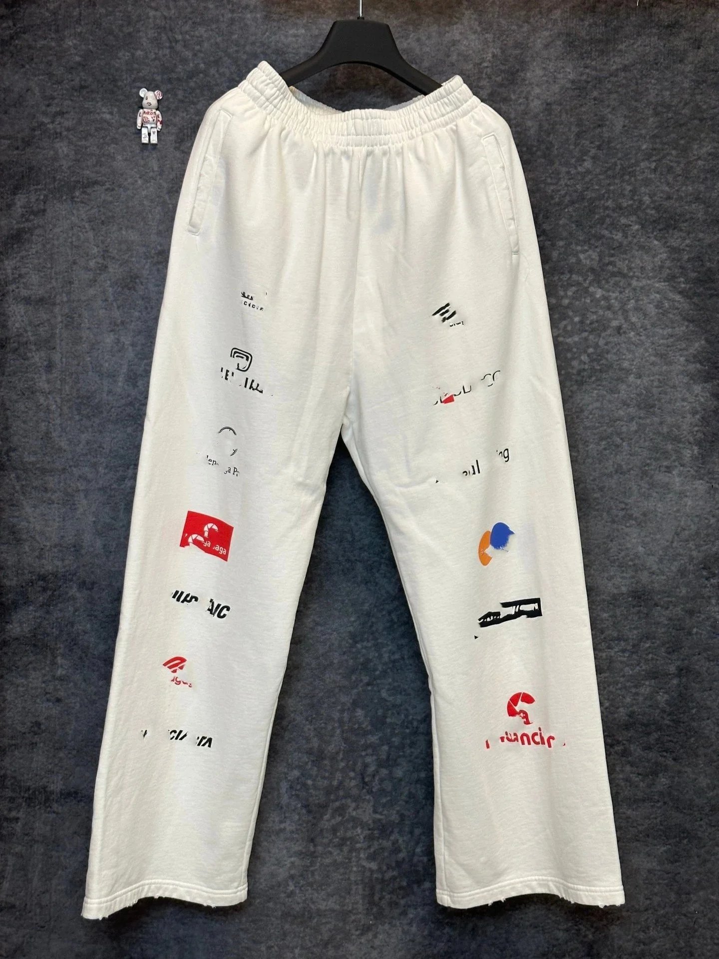 White Printed Casual Pants with Logo Patterns