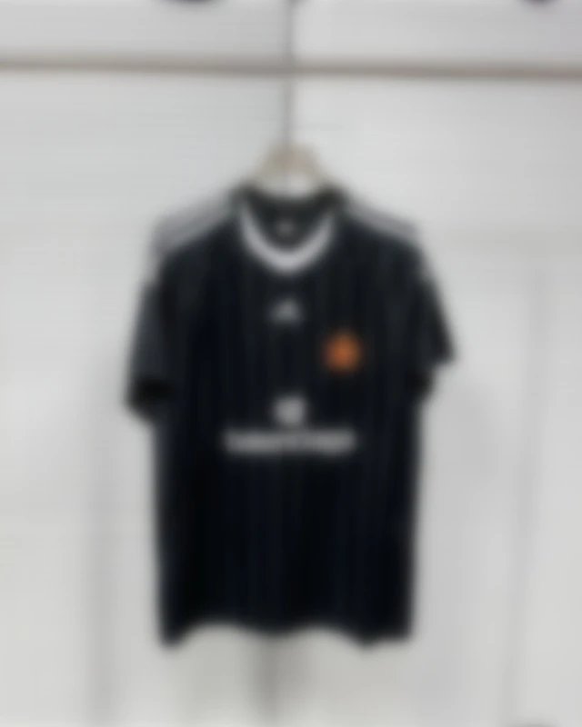 Adidas Black Football Jersey with Orange Logo