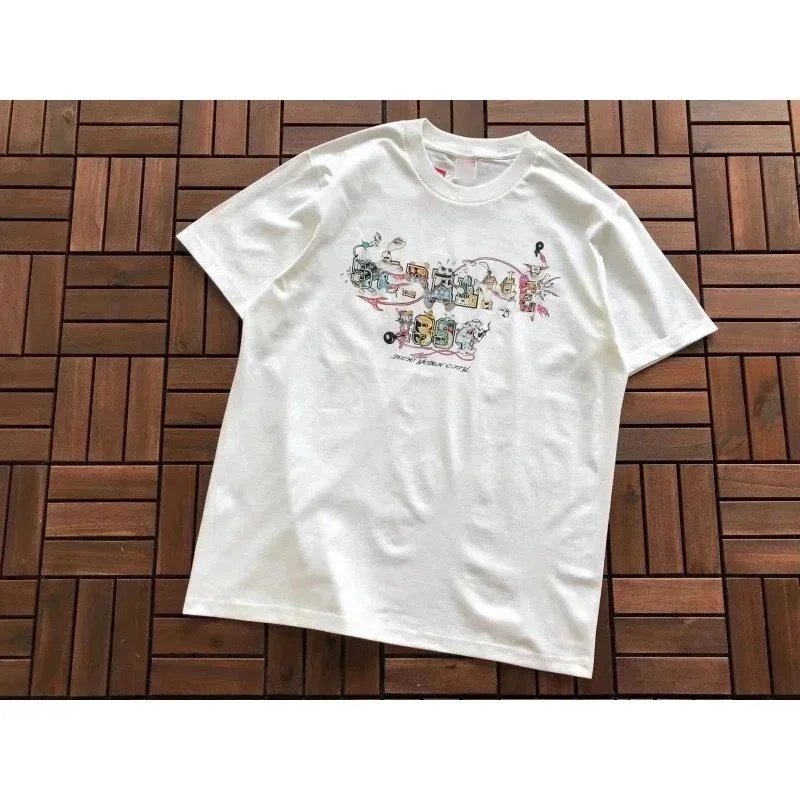 White Graphic T-Shirt with Colorful Print Design